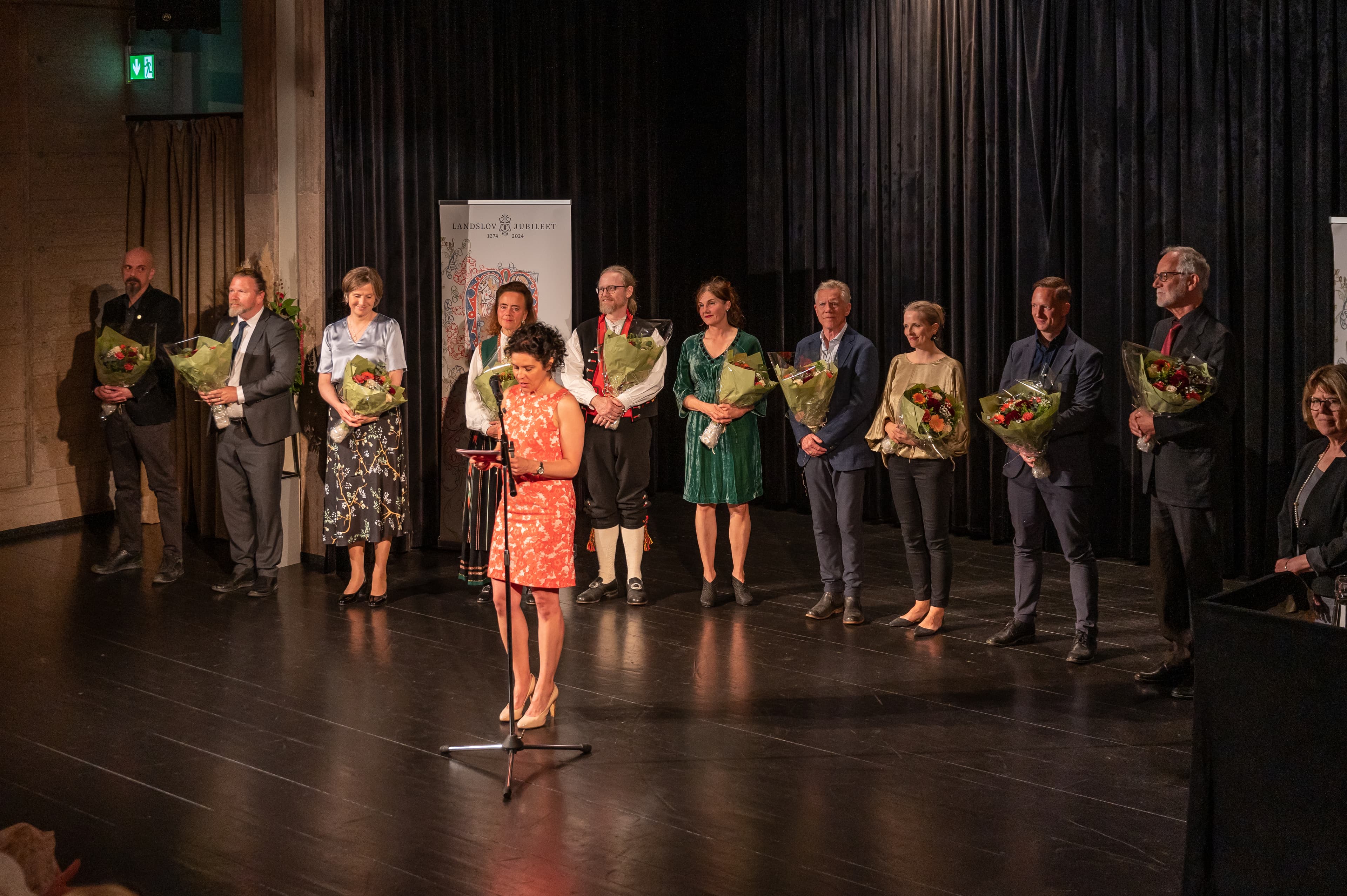 Photo of some of the contributors at the opening of the exhibition at Bryggen's museum.