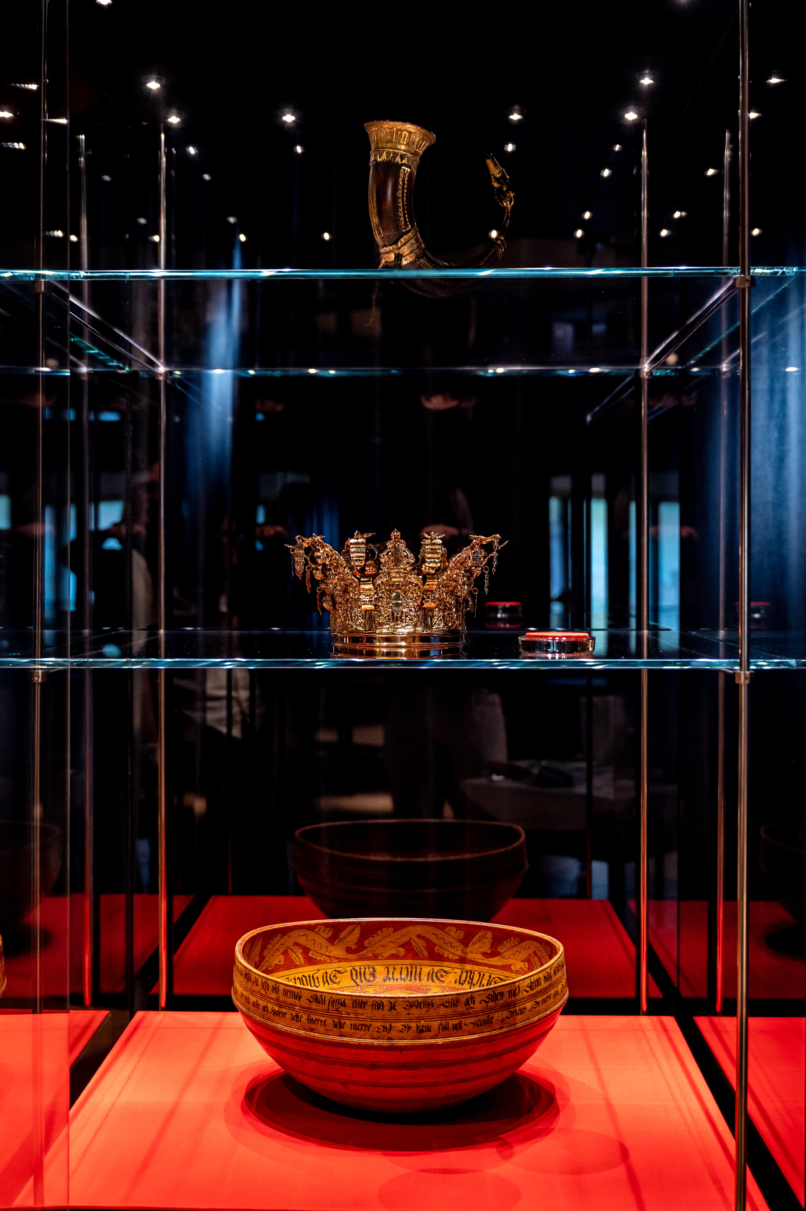 Drinking horn, bridal crown, and ale bowl from a showcase in the exhibition.